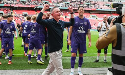 AFC Stoneham boss James Phillips soaks in the Wembley atmosphere after guiding the Purps to FA Vase glory