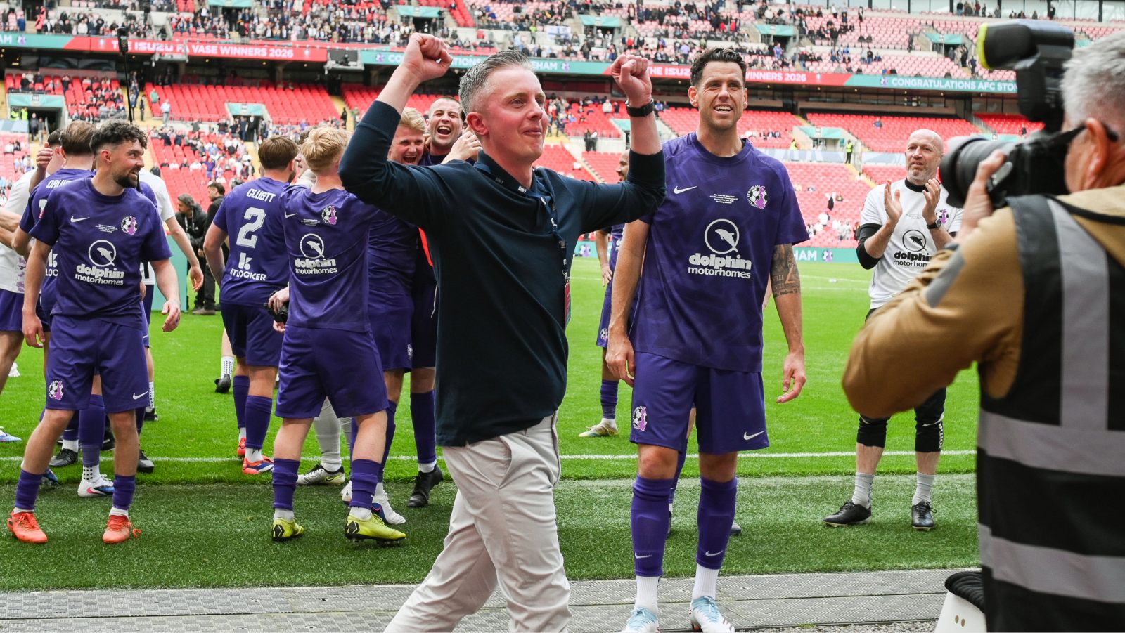 AFC Stoneham boss James Phillips soaks in the Wembley atmosphere after guiding the Purps to FA Vase glory