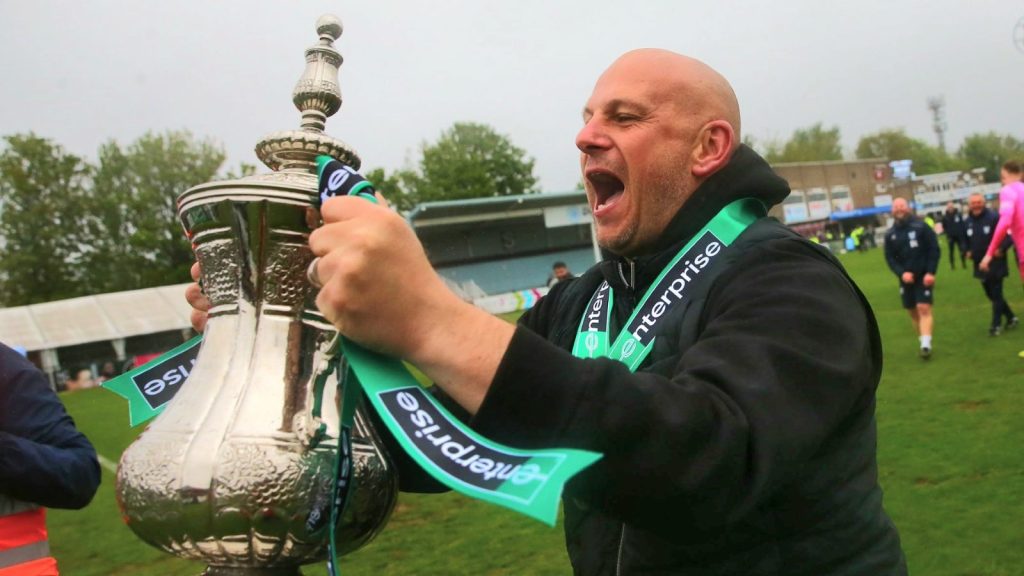 Adam Murray celebrates promotion with Kidderminster Harriers before his expected departure
