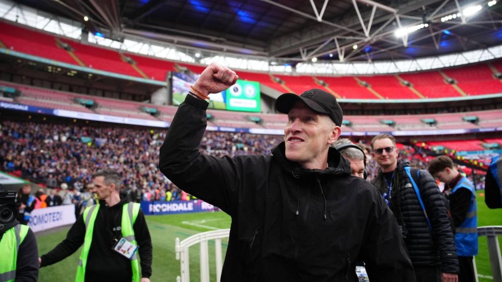 Jimmy McNulty celebrates after guiding Rochdale back to the EFL via a dramatic penalty shootout victory over Boreham Wood