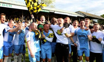 Burton Albion’s players celebrate winning promotion to the Football League