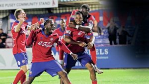 Tristan Abrahams leads the celebrations after scoring his second goal for Aldershot Town