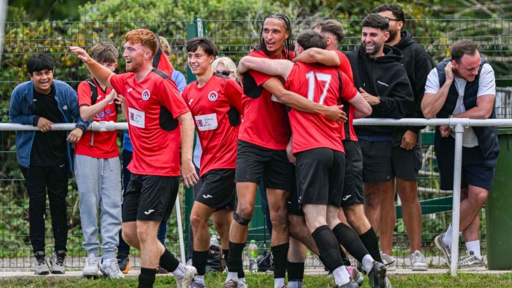 Knowle celebrate their late equaliser against Worcester City