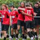 Knowle celebrate their late equaliser against Worcester City