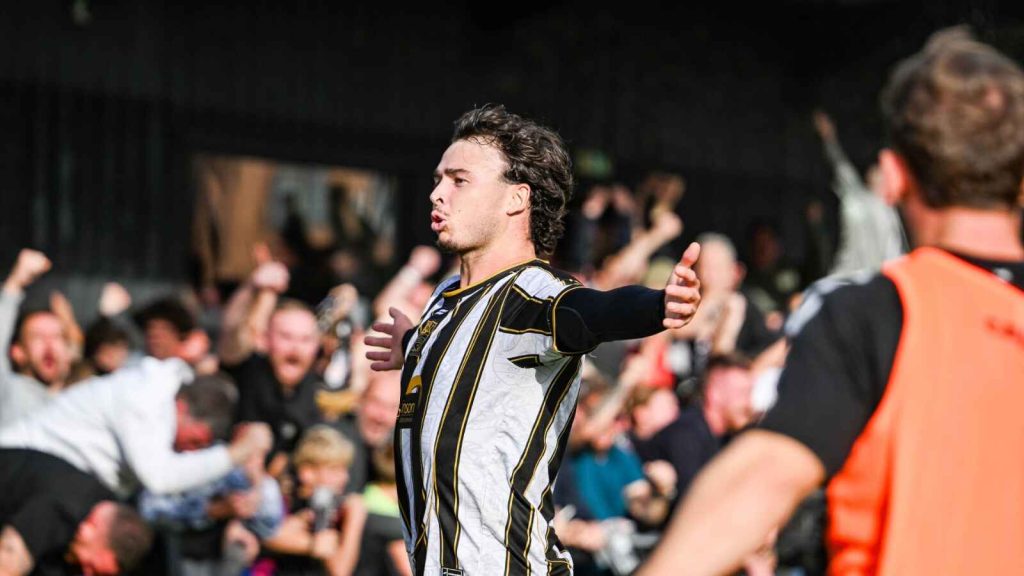 Scott Bakkor celebrates after his brace helped Stafford Rangers secure a famous FA Cup victory over Hereford.