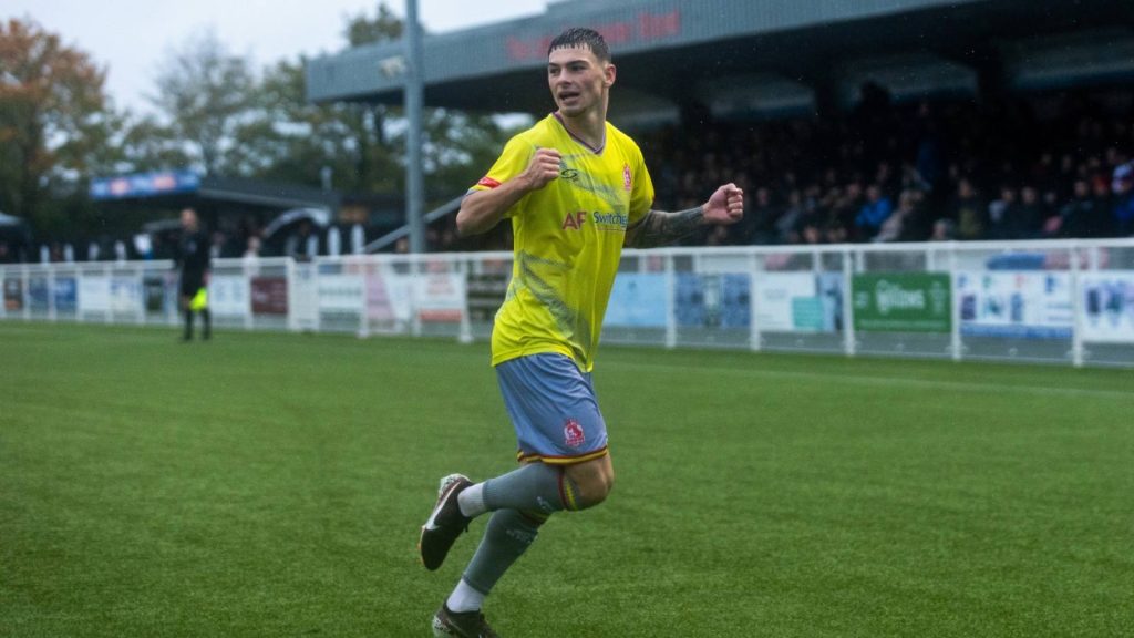 Riley McLachlan races away to celebrate his decisive goal for Alfreton Town.