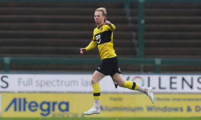 Charlie Kirk wheels away in delight after scoring for Altrincham
