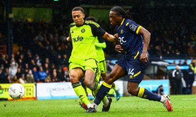 Promise Omochere of Southend United tries his luck