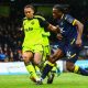 Promise Omochere of Southend United tries his luck