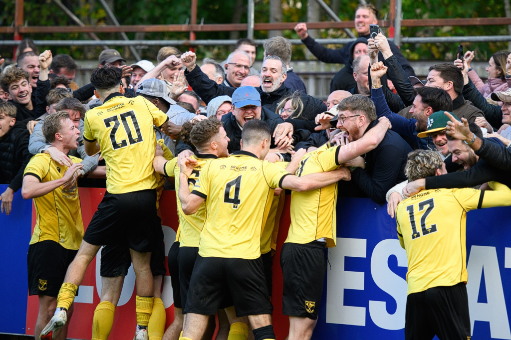 Tadley Calleva celebrate at the final whistle after earning a replay against Aldershot Town.