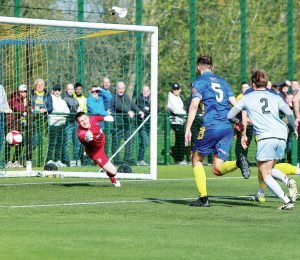 OUT OF REACH: Stephen Thompson’s free kick flies into the net to put Stockton Town ahead PICTURE: Shutterpress