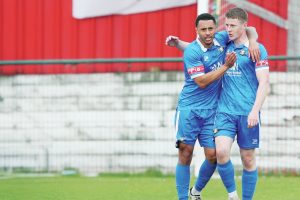 WELL DONE: Lewis Butroid, right, is congratulated for scoring the second Gainsborough goal PICTURE: Alun Roberts