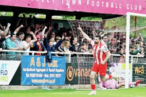 FOLLOW ME TO STEP 1: Brackley Town’s Danny Newton enjoys his goal PICTURE: Pete Keen