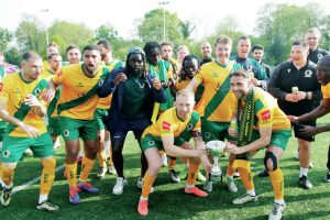 STING IN TAIL: Horsham celebrate as Isthmian League champions PICTURE: John Lines