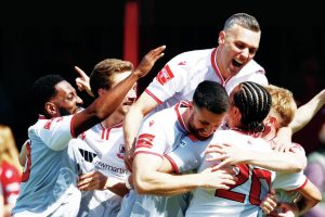 TON UP: Ramsgate rallied to the Isthmian South East title with over 100 points and 100 goals and celebrate, below PICTURE: Max Flego