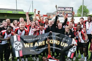 PITMEN PARTY: Hednesford Town players and staff celebrate promotion PICTURE: Garry Griffiths