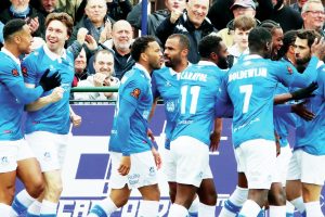 OH YES! Wealdstone celebrate in their crucial 3-1 win against FC Halifax and, Inset, manager Neil Gibson PICTURE: Jon Taffel