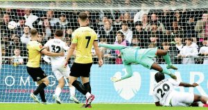 WOOD YOU BELIEVE IT! Charles Clayden scores Boreham Wood’s winning goal, sparking wild celebrations PICTURE: Hellen Terrell