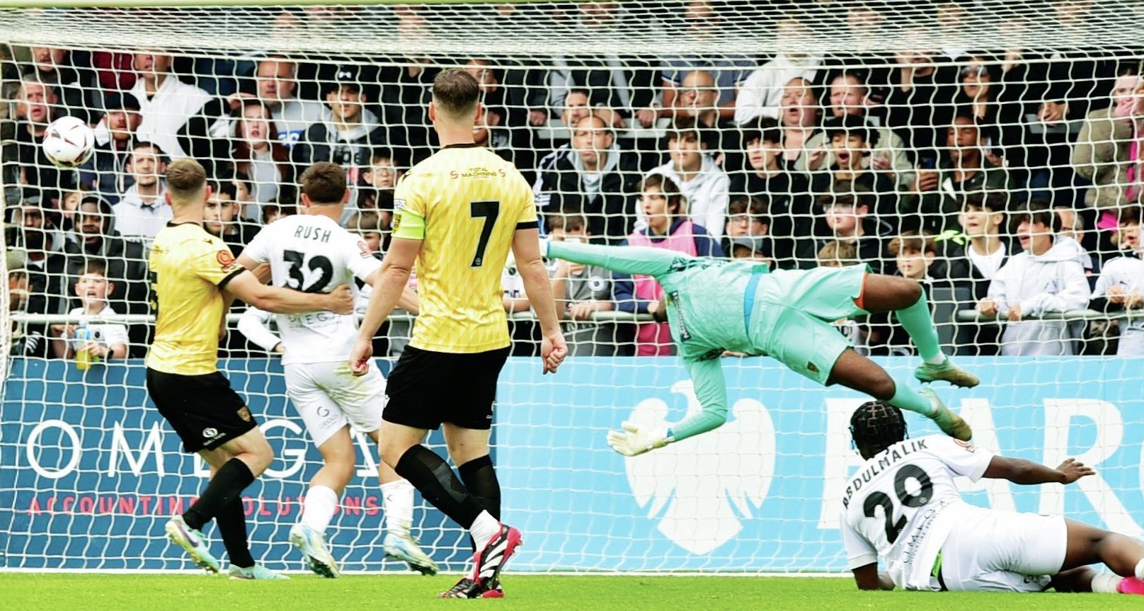 WOOD YOU BELIEVE IT! Charles Clayden scores Boreham Wood’s winning goal, sparking wild celebrations PICTURE: Hellen Terrell