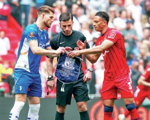 READY FOR BATTLE: Captains Charlie Raglan, of Oldham, left, and Southend’s Nathan Ralph PICTURE: Alamy