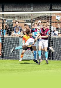GOOD SCRAP: Huddersfield go close against the Pewits PICTURE: Chris Hyslop