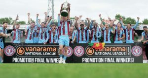 WE’RE ON THE UP: Scunthorpe United players celebrate promotion  PICTURE: Luke Broughton