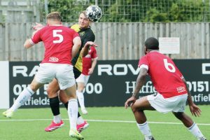 HEADS UP: Marine’s Harvey Gregson sends an effort towards goal PICTURE: Alun Roberts