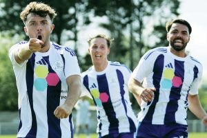 BETTER LATE THAN NEVER: Owen Humphries celebrates his last-gasp winner for Clevedon PICTURE: Gary House