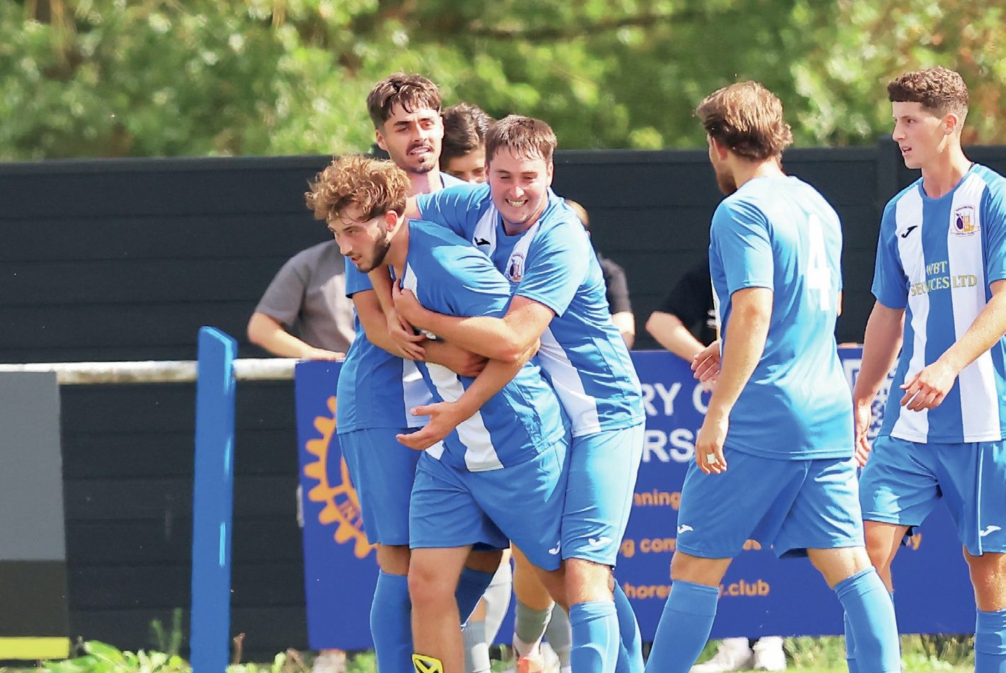 BOY WONDER: Archie Thurston is congratulated by his Pershore teammates after scoring the winner PICTURE: Gary Learmonth