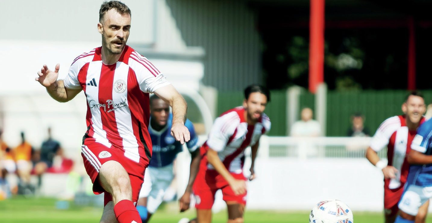 BEST FOOT FORWARD: Brackley’s Shane Byrne keeps his cool to put his side ahead from the penalty spot PICTURE: Mitch Davidson