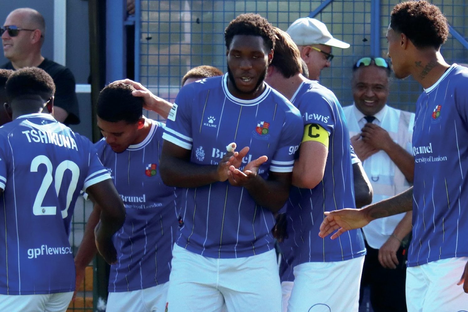DOUBLE DELIGHT: Wealdstone celebrate their second goal from Dominic Hutchinson PICTURE: Jon Taffell