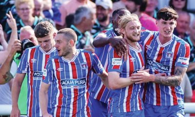 HERE WE GO: Luke Armstrong, second from right, is congratulated on giving Carlisle the lead PICTURE: Phil Fiddes