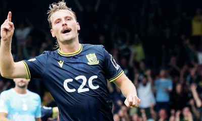 MAKING HIS POINT: Scott-Morriss enjoys scoring his side’s second goal PICTURE: Focus Images