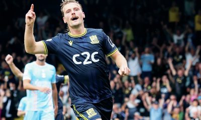 MAKING HIS POINT: Scott-Morriss enjoys scoring his side’s second goal PICTURE: Focus Images