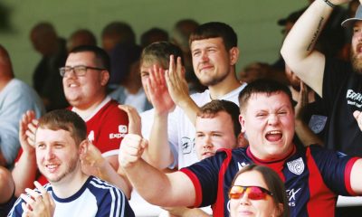 SING WHEN WE’RE WINNING: Merthyr Town fans in full voice after their Southern League Premier South success PICTURE: Julia Urwin