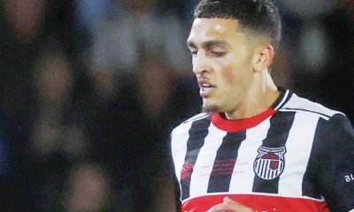 STEPPING IT UP: Jaze Kabia against Man Utd and inset, celebrating for Truro City PICTURE: Alamy