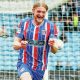 Luke Armstrong wheels away in delight after scoring Carlisle’s opening goal