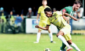 Kingstonian’s Darnell Goather skips past Leatherhead’s Tauta-Caballero in the last round