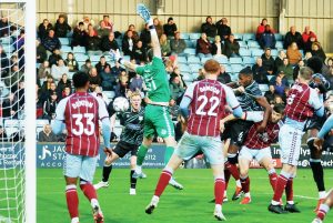 Carlisle’s Aaron Hayden heads what proves to be the winning goal
