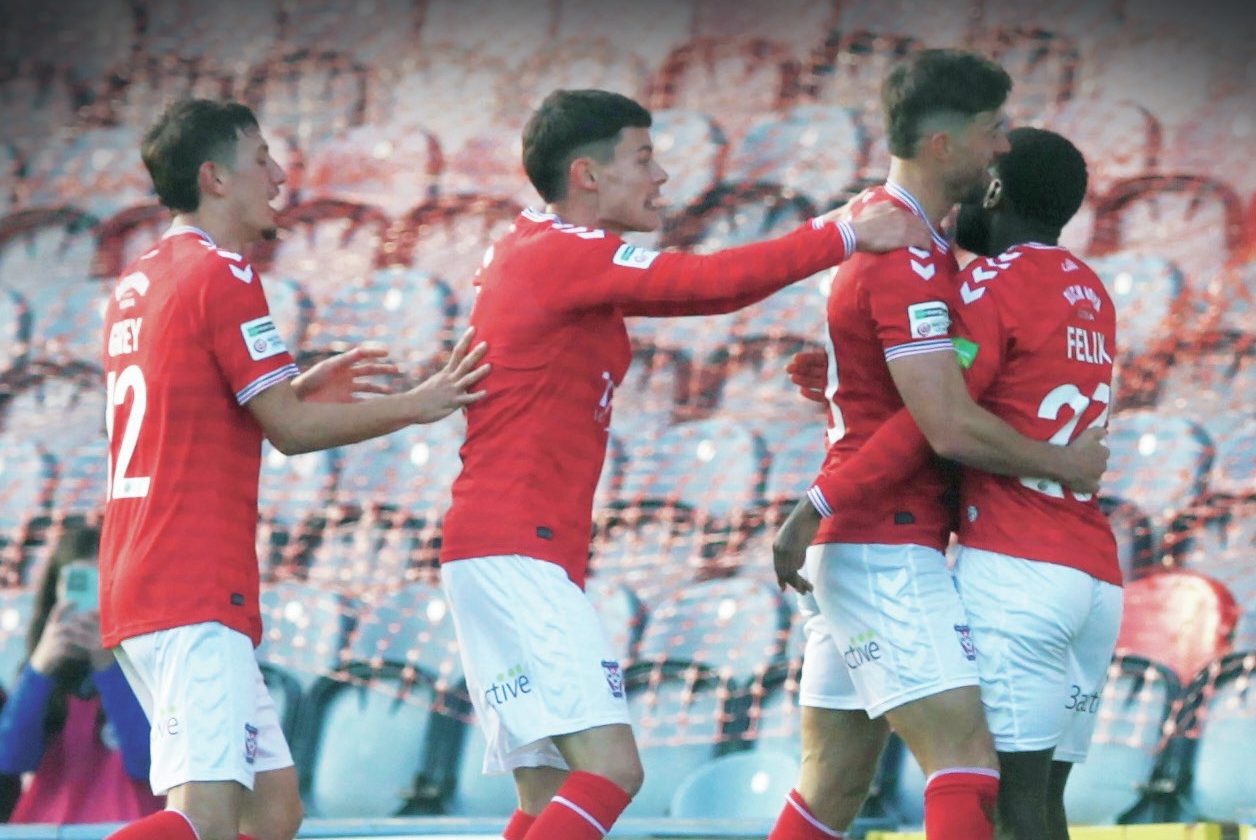 Alex Newby, centre, takes the plaudits from York team-mates Joe Felix and Alex Hunt