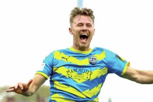 Radcliffe’s Rick Smith celebrates Lois Maynard’s goal