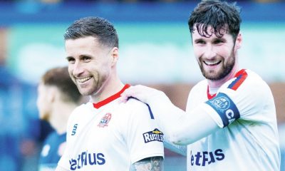 Fylde skipper Corey Whelan congratulates Ryan Colcough
