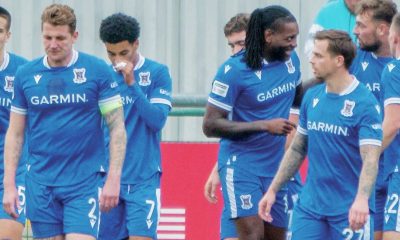 Tyler Cordner, second right, leads the celebrations after firing AFC Totton in front