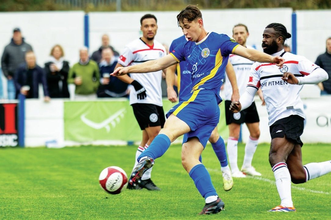 Lancaster City’s Matty Clarke shoots at goal