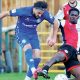 Rochdale’s Tarryn Allarakhia is challenged by Woking’s Timmy Akinola