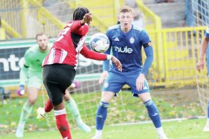 Exeter’s Akeel Higgins takes aim for his side