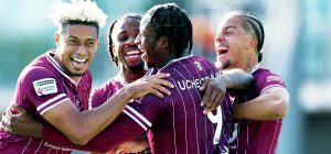 Lyle Taylor, left, celebrates with teammates after scoring the second goal