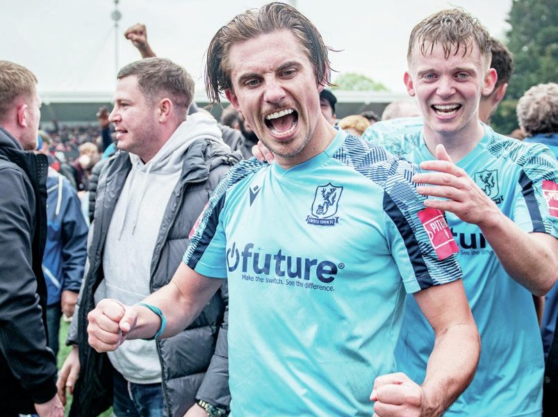 Sam Youngs celebrates winning promotion