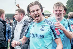 Sam Youngs celebrates winning promotion