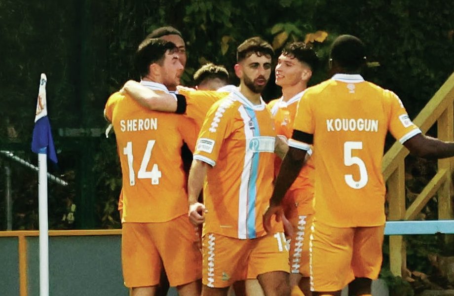 Goalscorer Adam Campbell is swamped by his Hartlepool team mates